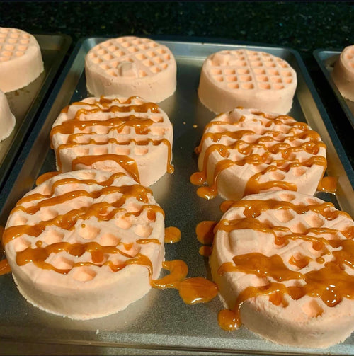 Tray of Fall Waffles bath bombs with caramel drizzle, fresh from the bench