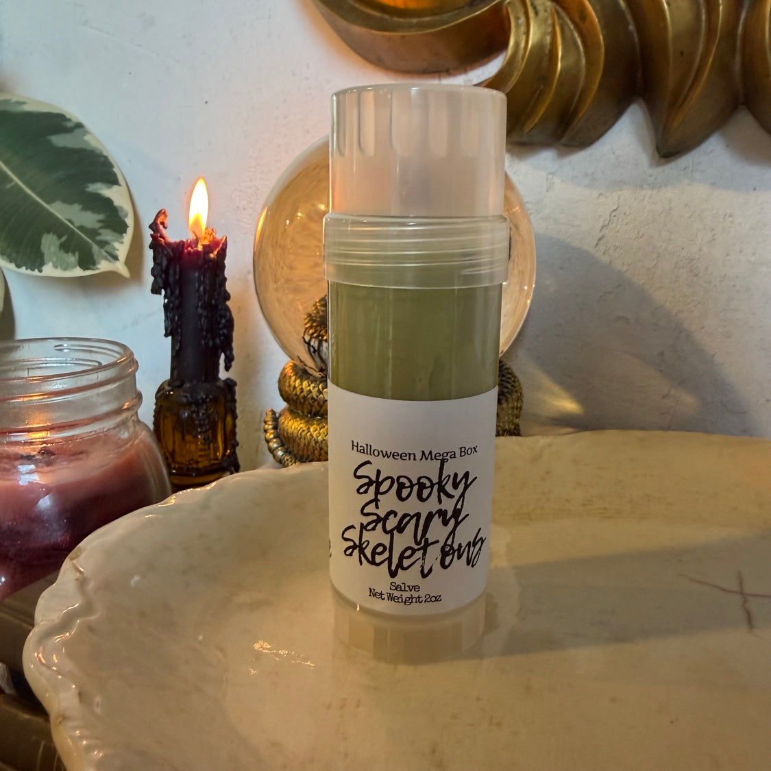 Spooky Scary Skeletons salve stick from the Halloween Mega Box, scent label front